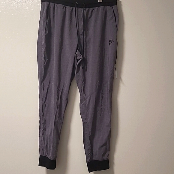 Nike Women's Bonded Woven Pants  charcoal grey Size Large - Picture 1 of 12